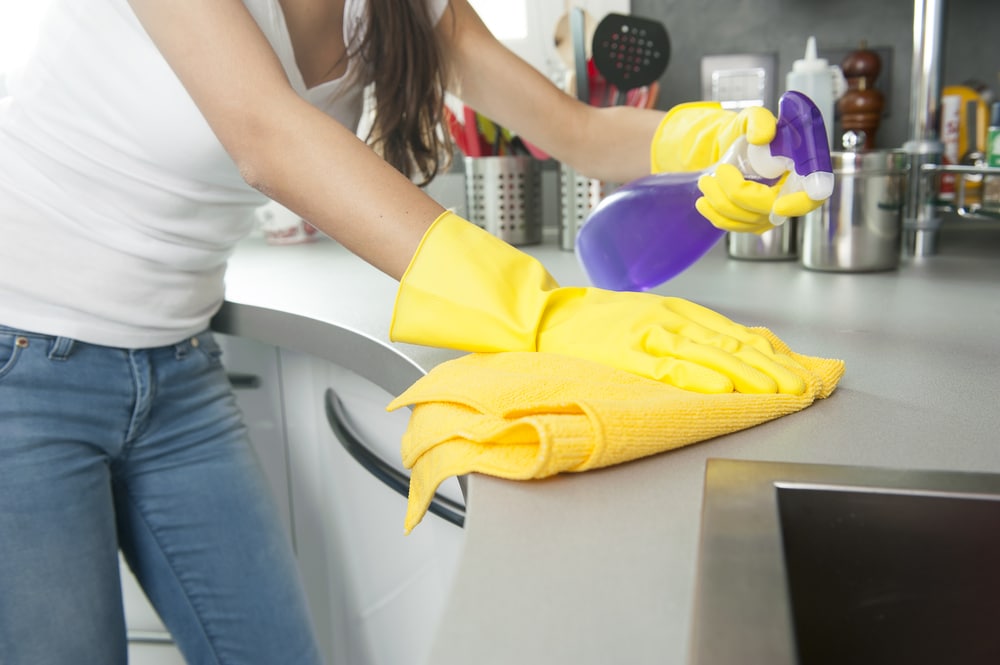 cleaning a kitchen cleaning a kitchen
